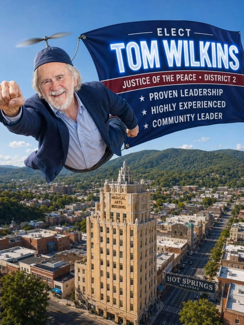 Playful illustration of Tom Wilkins in a propeller cap flying over downtown Hot Springs and the Medical Arts Building, towing an 'Elect Tom Wilkins' banner